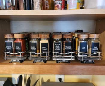 The reviewer's neat spice cabinets with the spice racks