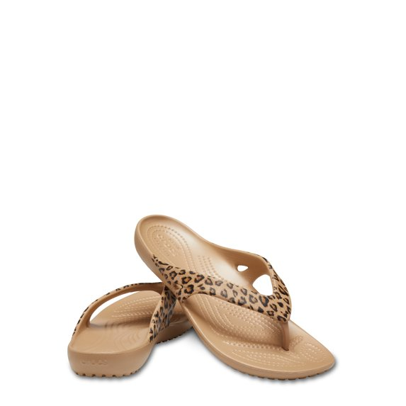 Pair of leopard people     flip-flops with textured soles, positioned somewhat  overlapping connected  a neutral background