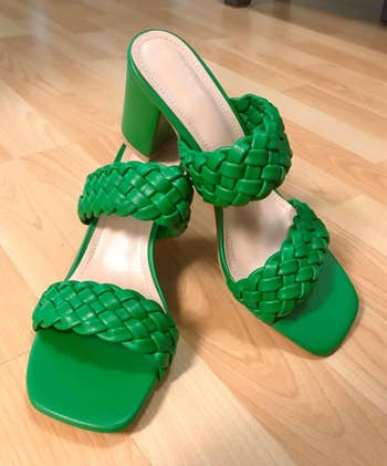 close up of a reviewer's green sandals
