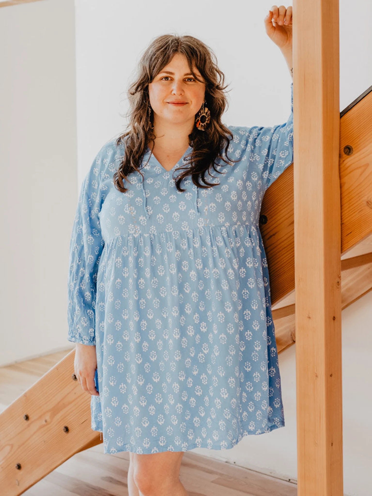model with printed above the knee tunic dress
