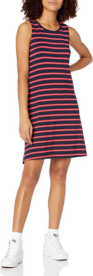 model wearing the dress in navy and red stripes