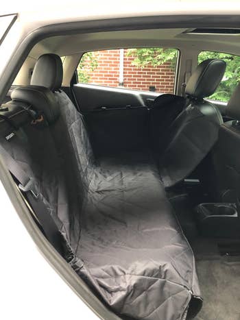 The black seat cover in car bench style