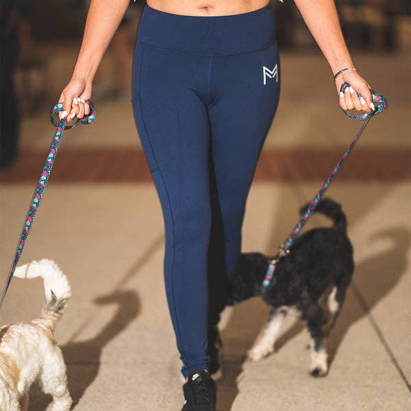 model wearing the Essential Solids collection in navy walking tow dogs