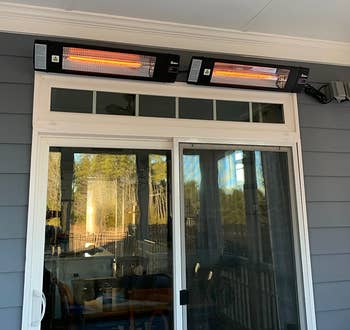 Two heaters above reviewer's doors of an outdoor deck