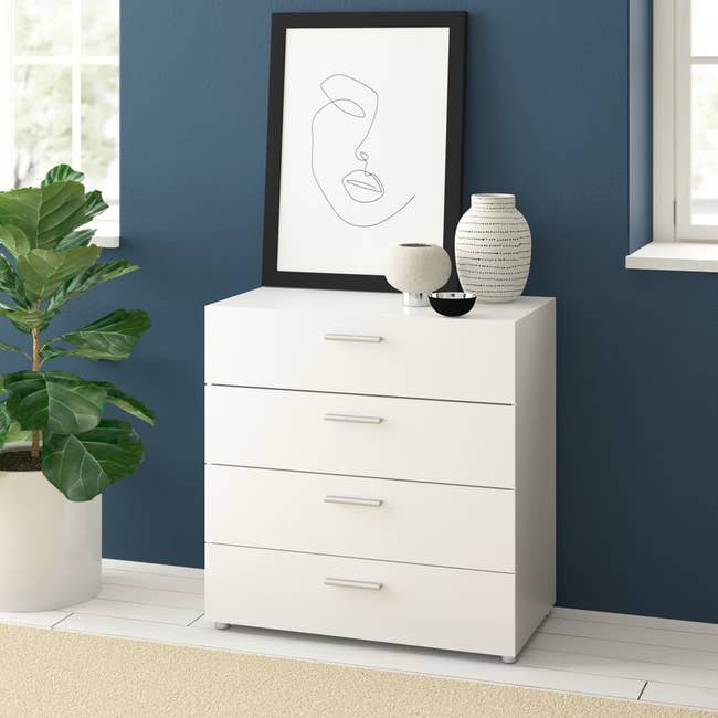 A small white dresser