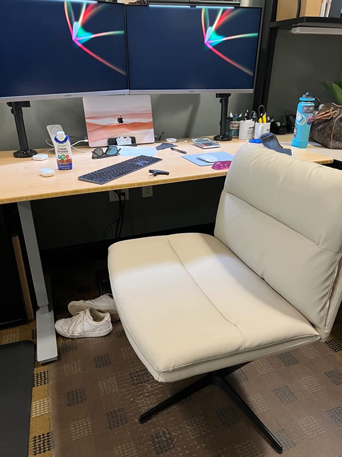 the white armless desk chair at a reviewer's desk