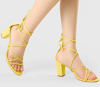 Image of model wearing yellow sandals