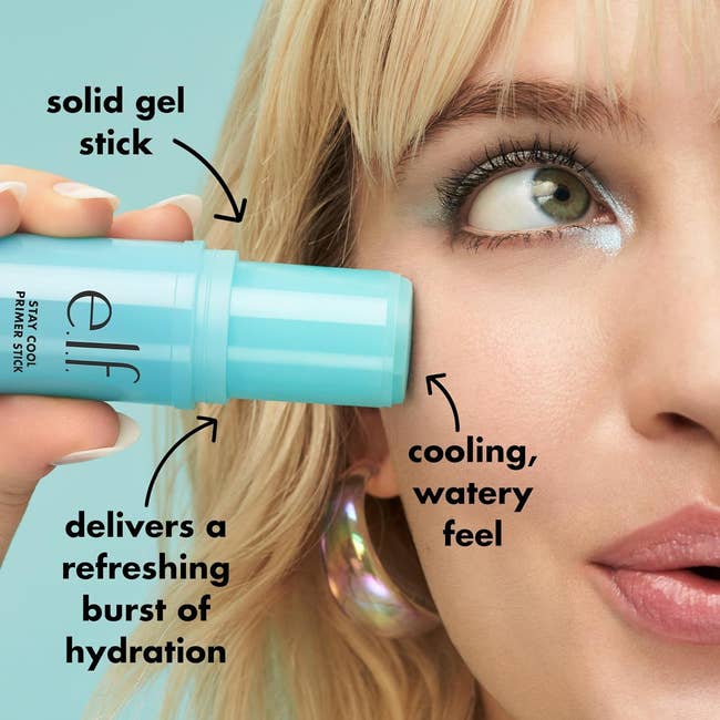 Close-up of a model applying Elf Stay Cool primer stick 