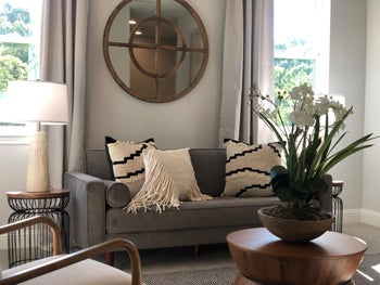 reviewer photo of gray velvet couch in living room