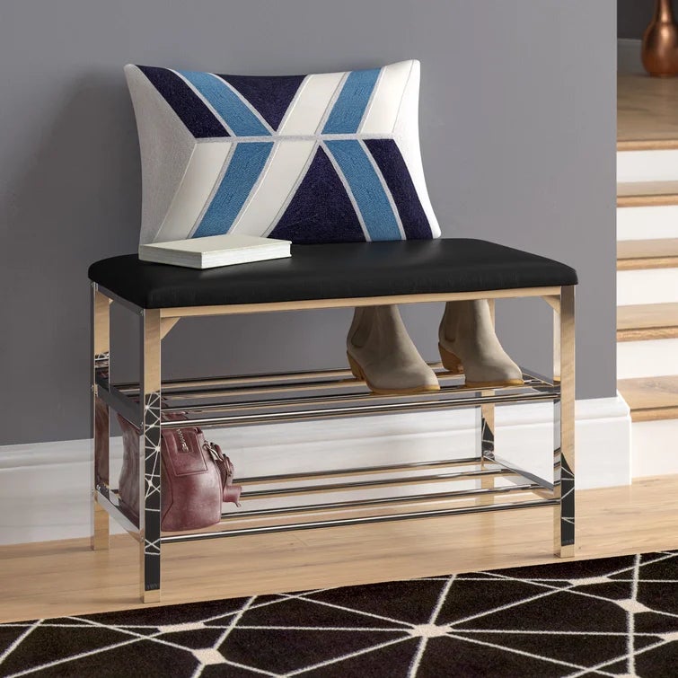 bench shoe rack with a pair of shoes on it and a purse