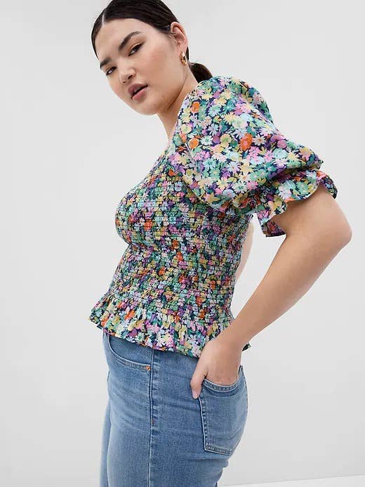model wearing the floral print top