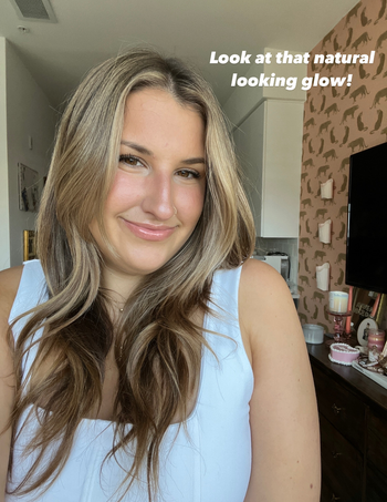 ali wearing balm on cheeks and nose