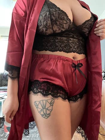 reviewer wearing red set