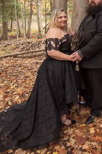 Reviewer wearing the black dress outdoors