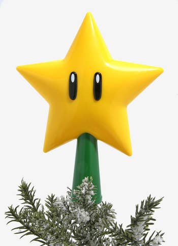a star-shaped tree topper from super mario bros