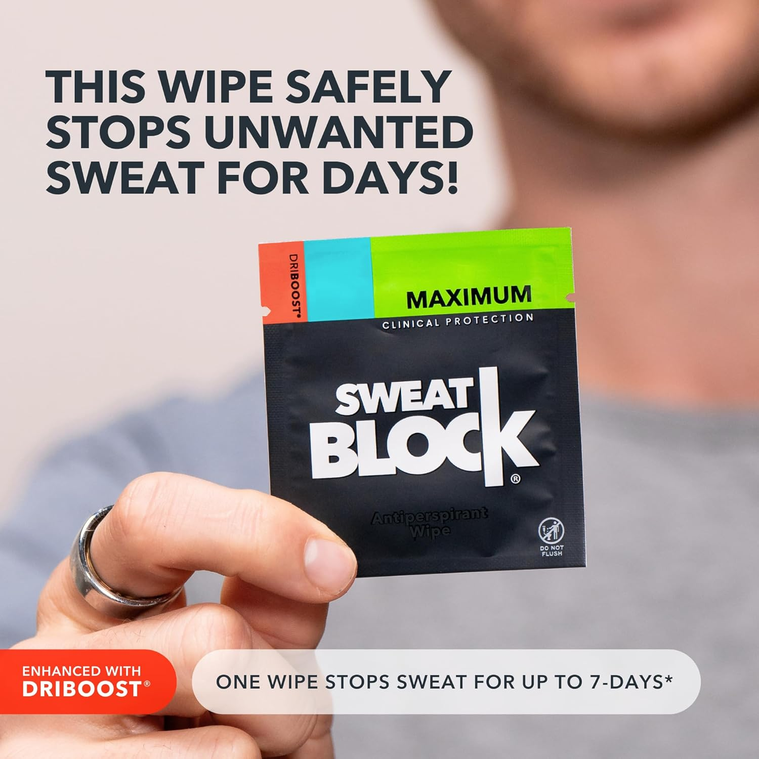Person holding a SweatBlock antiperspirant hitch   packet. The substance   highlights its 7-day sweat extortion  and DRIBOOST enhancement