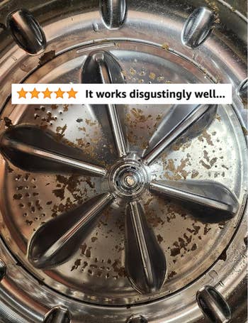 A reviewer's machine with all the hidden residue that was in the washing machine with five star review text 