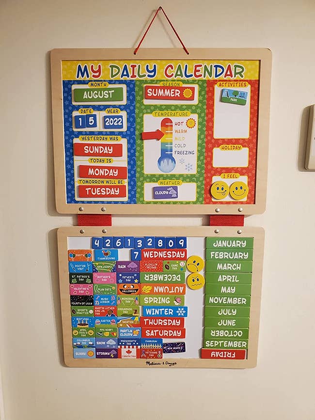 reviewer image of the kid's daily calendar hanging on a wall