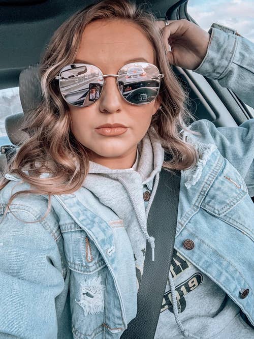 a reviewer in the rose gold mirror lenses