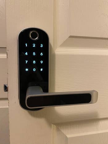 reviewer's smart lock with keypad on