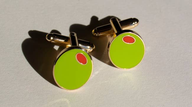 The green olive cufflinks with gold-tone metal