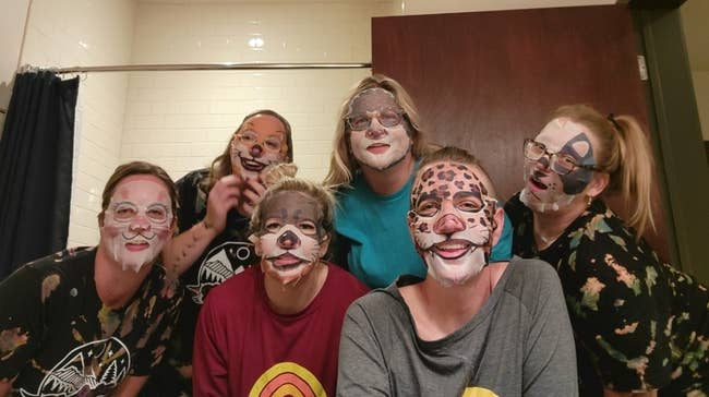 Reviewers in different animal shaped face masks including a cheetah, panda, llama, otter, and cat 