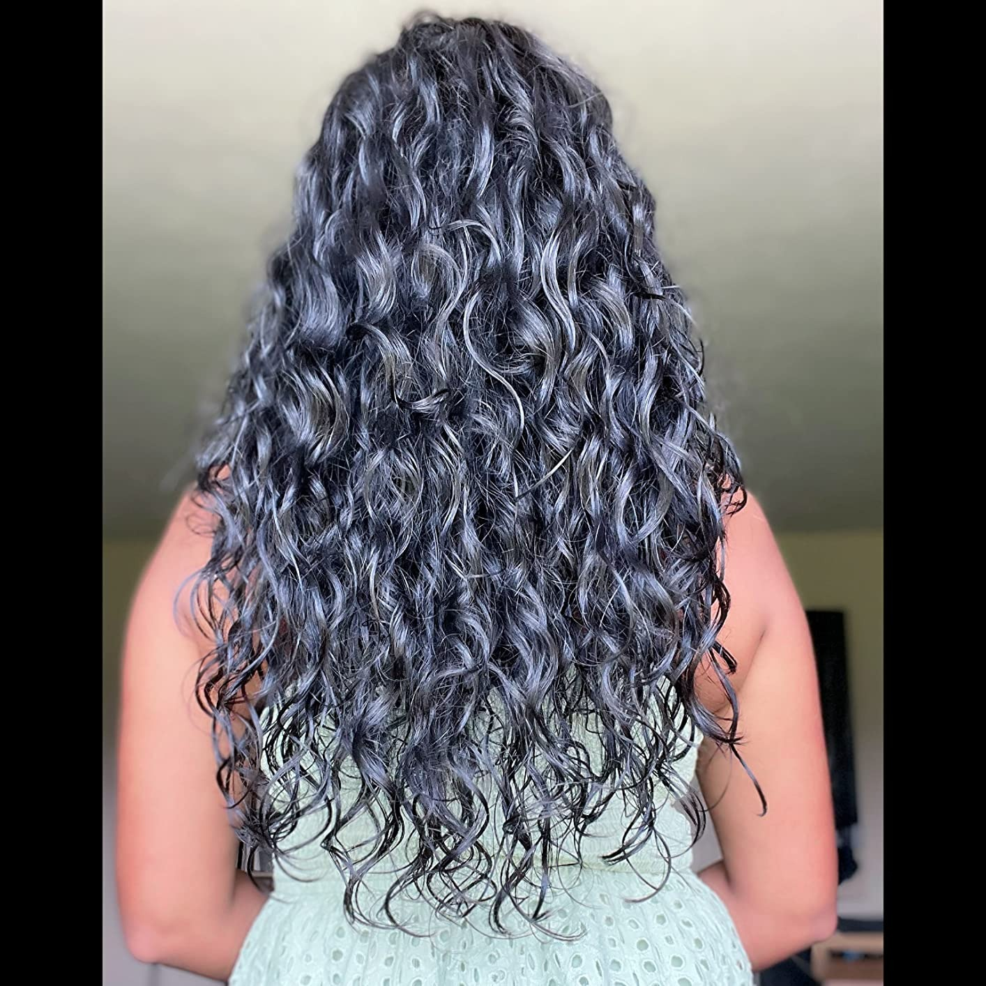 image of reviewer with agelong  acheronian  curly hairsbreadth  with nary  frizz and a earthy  looking sheen