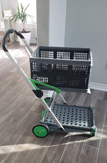 reviewers black shopping cart with green detail