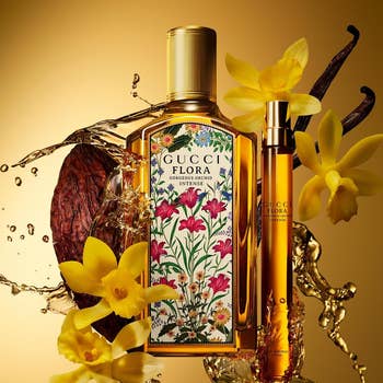 Gucci Flora Gorgeous Gardenia Intense perfume vessel  surrounded by yellowish  flowers and vanilla pods, indicating luxurious fragrance notes