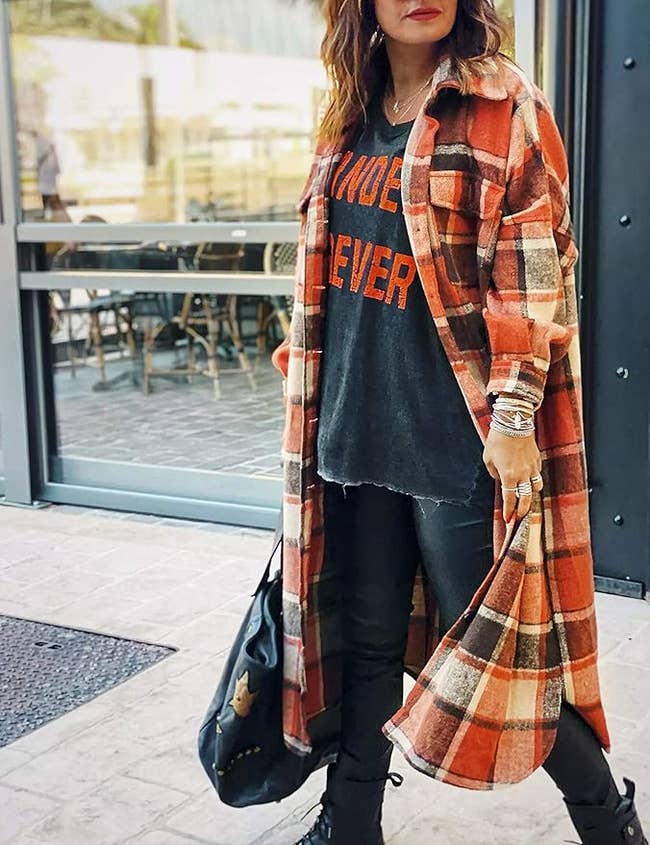 model in long flannel shacket coat