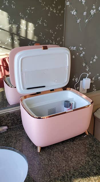 reviewer photo of an open pink beauty cooler
