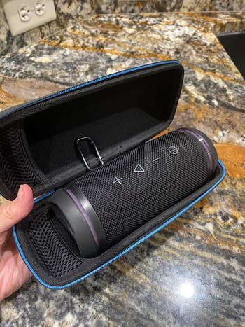 reviewer image of the speaker in its carrying case