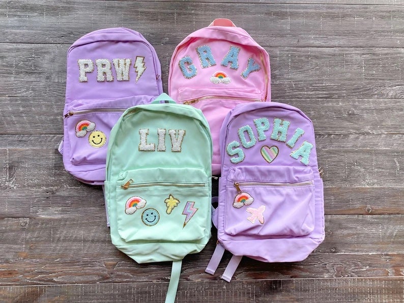 Personalized backpacks with patches in four colors