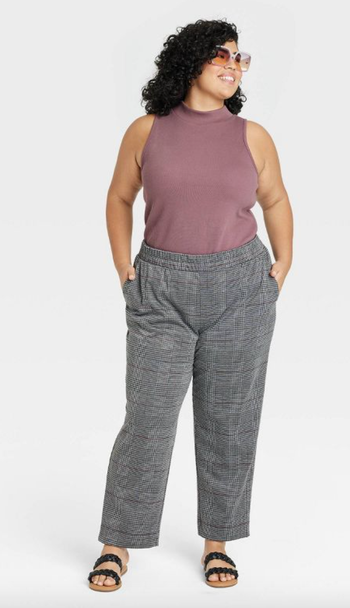 different model wearing them in gray plaid