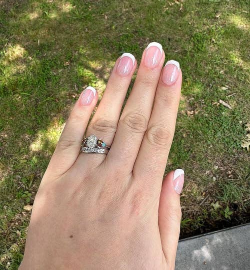Fair toned reviewer with the short square nails applied