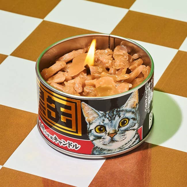novelty cat food candle with Japanese text on the label