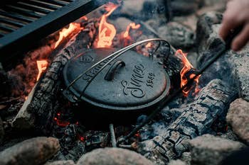 dutch oven cooking in campfire