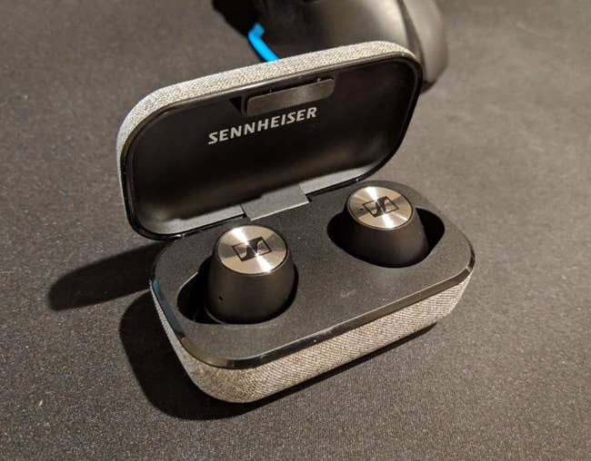 reviewer photo of the wireless earbuds in the case