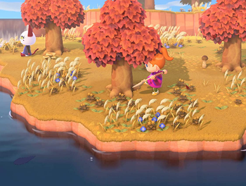 screenshot of a player character digging up a tree