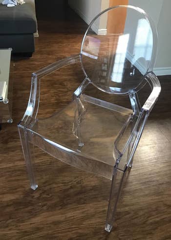 a reviewer photo of the clear acrylic armchair 