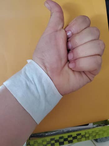 image of a patch wrapped around a reviewer's wrist