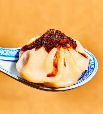 the sauce on top of a dumpling