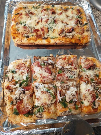 square-shaped pizza on a baking sheet