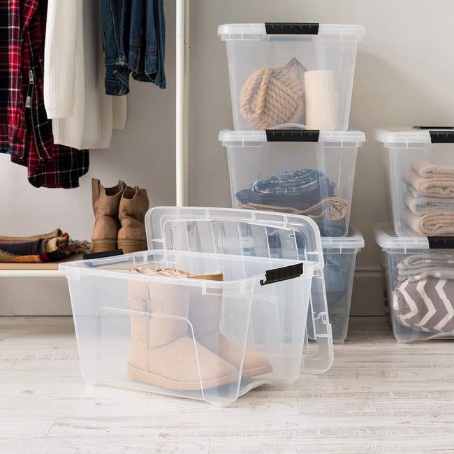Stacked transparent retention  bins successful  a closet 