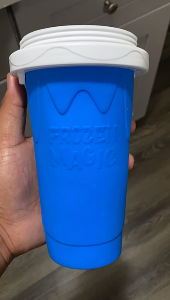 The small blue cup-shaped slushy maker 