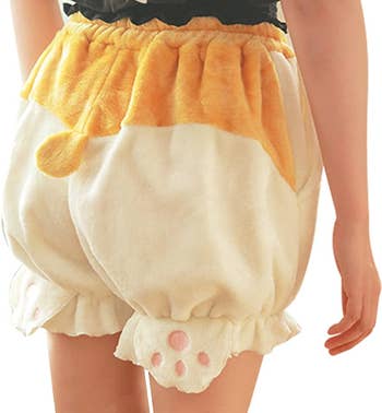 the fleecey bloomers with pockets, printed to look like a corgi butt, complete with paws and a tail