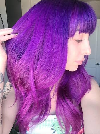 same reviewer showing off purple ombre hair
