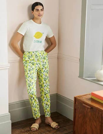 model in yellow and green lemon print pants
