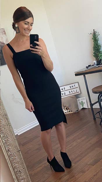 another reviewer wearing the black midi dress