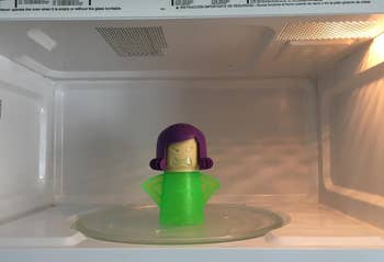 same reviewer's after of the angry mama in a clean microwave
